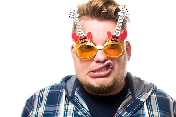 guy with glasses in a guitar - Fotó, kép