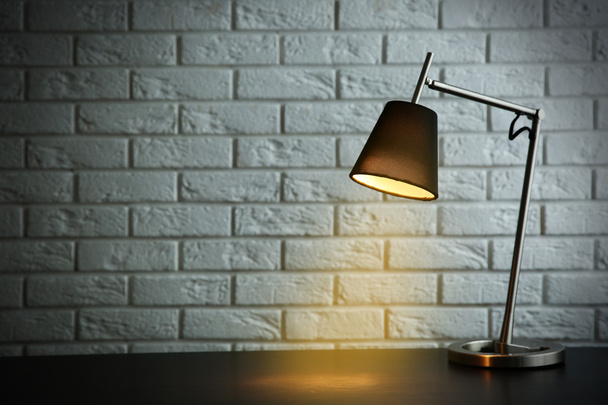 Modern lamp on desk  - Foto, Imagem