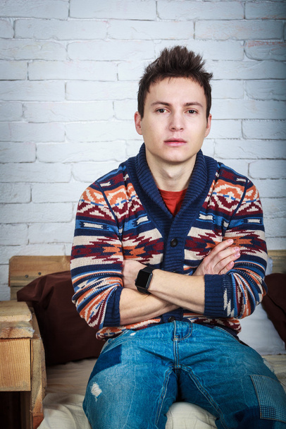 young handsome man sitting on a chair - Photo, Image
