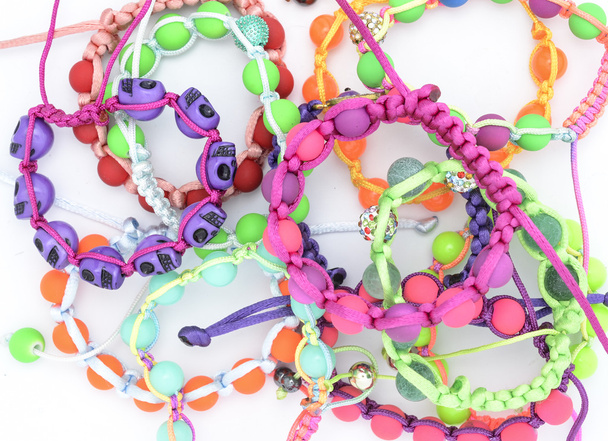 colored bracelets on the heap - Foto, Imagem