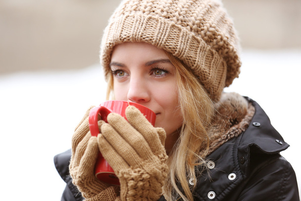 girl enjoying cup of tea - Foto, Imagem