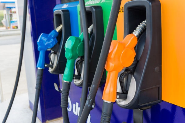 Close up of colourful fuel pumps - Photo, Image