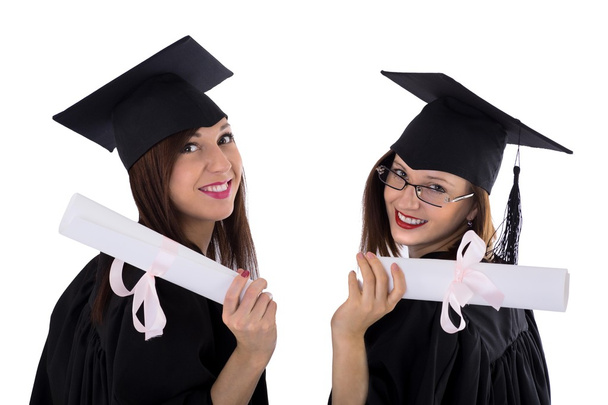 Молоді дівчата в студентській мантії з дипломом
 - Фото, зображення