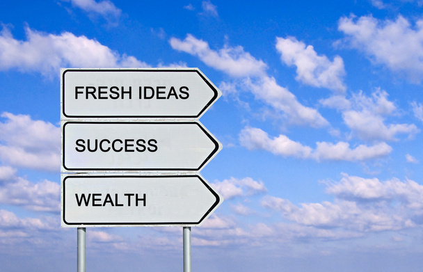 Road sign to fresh ideas,success, wealth - Photo, Image