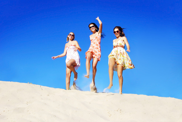Beautiful girls on the beach - Photo, Image