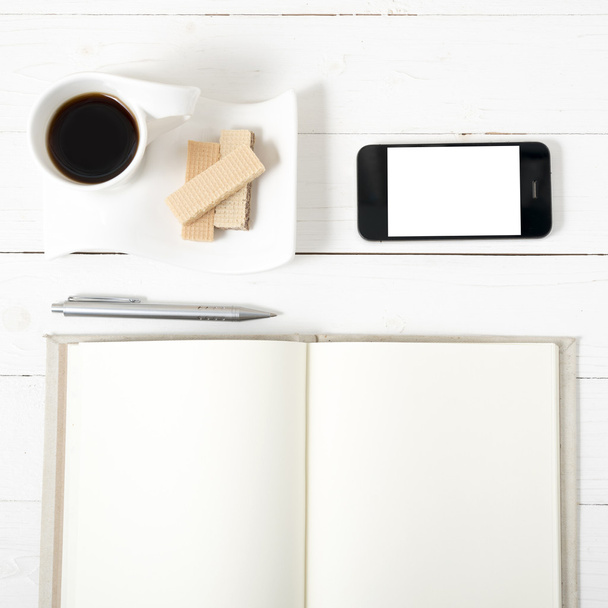 coffee cup with wafer,phone,notebook - Φωτογραφία, εικόνα
