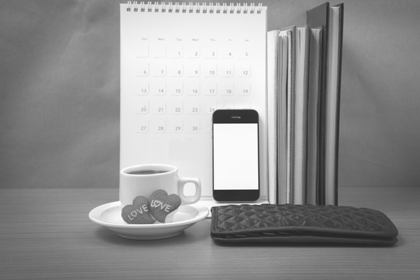 office desk : coffee with phone,wallet,calendar,heart,stack of b - Photo, image