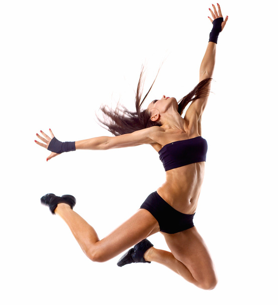Stylish and young modern style dancer jumping - Foto, Imagen