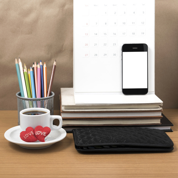 office desk : coffee with phone,wallet,calendar,heart,color penc - Фото, зображення