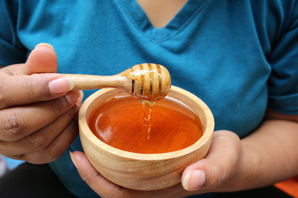 Fresh honey with honey dipper  - Photo, Image