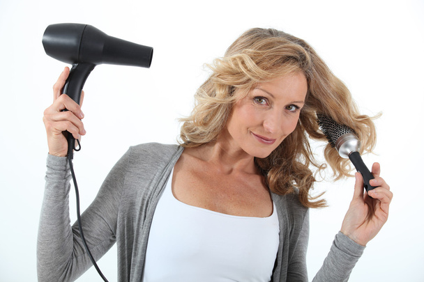 Woman drying hair - Foto, Imagem