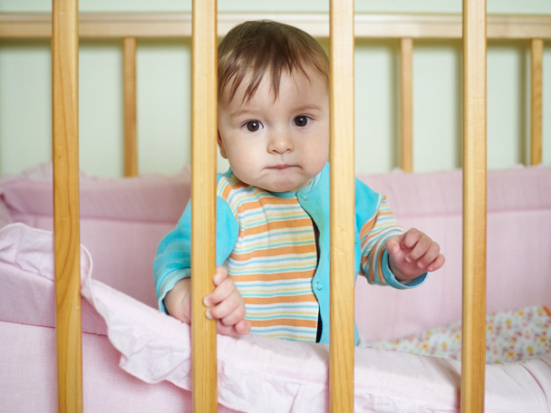 Little baby in a cot.  - Photo, Image