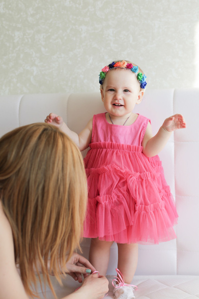 Portrait of cute little girl in pink dress - Foto, imagen
