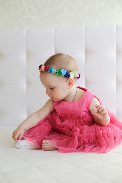 Portrait of cute little girl in pink dress - Fotografie, Obrázek
