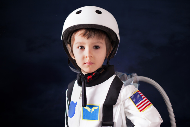 Beautiful portrait of preschool boy, dressed as astronaut - Foto, Imagen