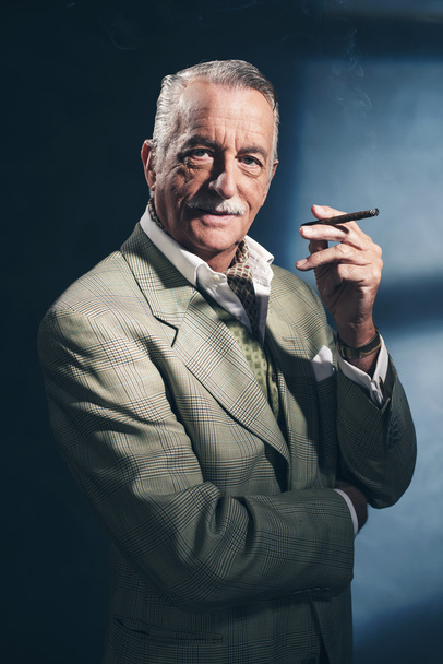 Cigar smoking retro 1940 senior businessman. - Фото, изображение