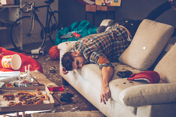 handsome man with hangover - 写真・画像