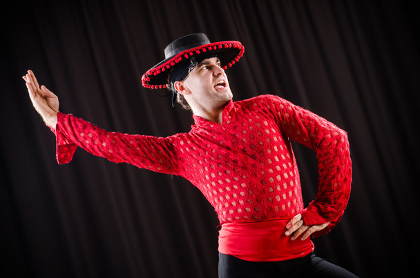 Man dancing spanish dance in red clothing - Photo, Image