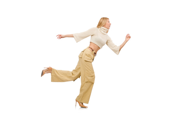Красива жінка в бежевих брюках ізольована на білому
 - Фото, зображення