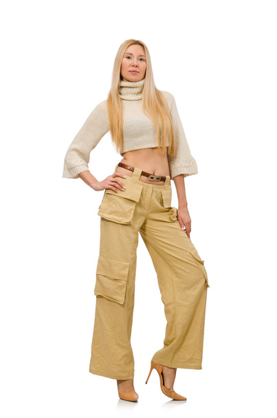 Pretty woman in beige trousers isolated on white - Foto, imagen