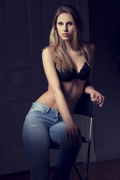 Low key fashion shot of alluring girl with bra - Photo, image