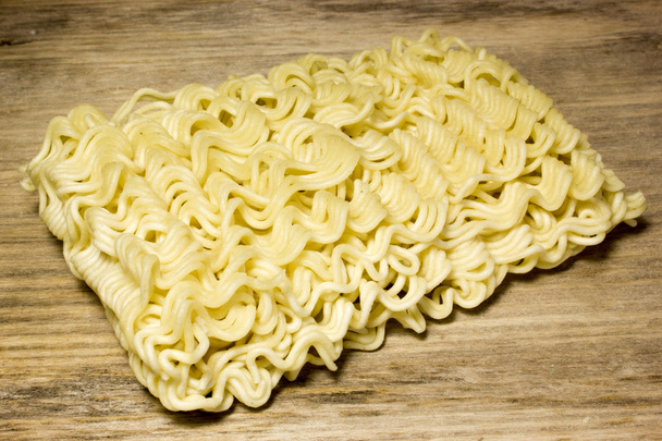 Instant noodles on wooden background - Photo, Image