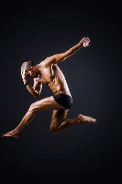 Ripped muscular man in sports concept - Fotoğraf, Görsel