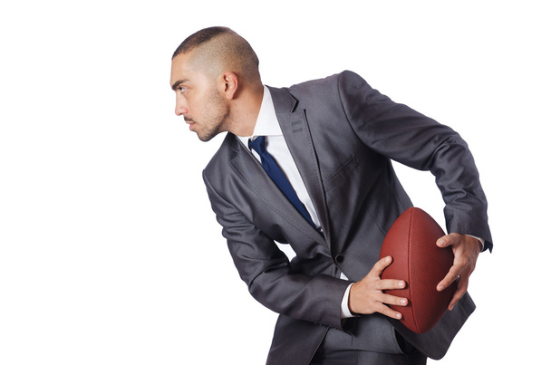 Man with american football ball isolated on white - Photo, image