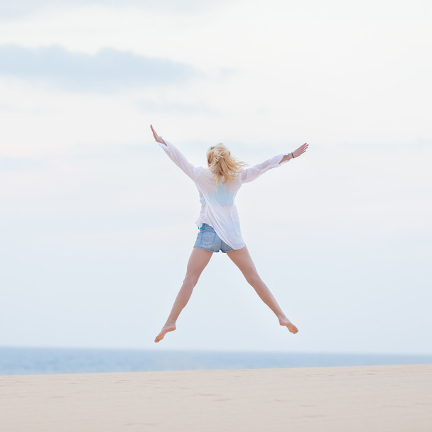 Carefree woman enjoying freedom. - Photo, Image