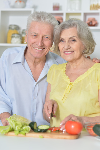 senior man and woman  in the kitchen - Photo, Image