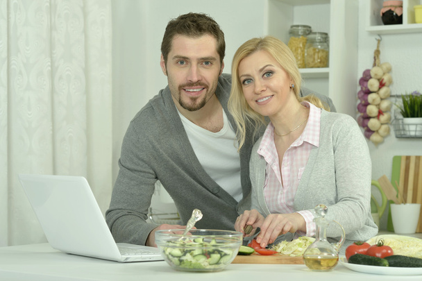 happy couple cooking in  kitchen - Fotografie, Obrázek