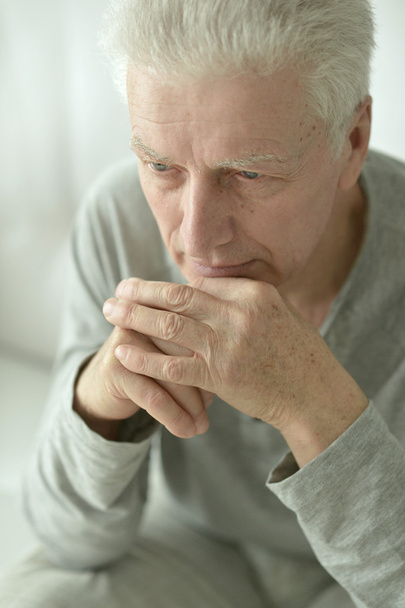 Sad senior man at home - Fotó, kép