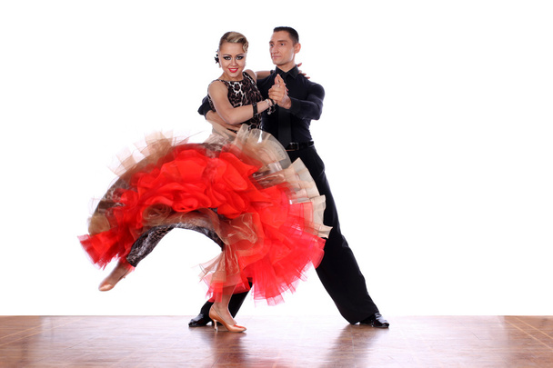 Latino dancers in ballroom against white background - Photo, image