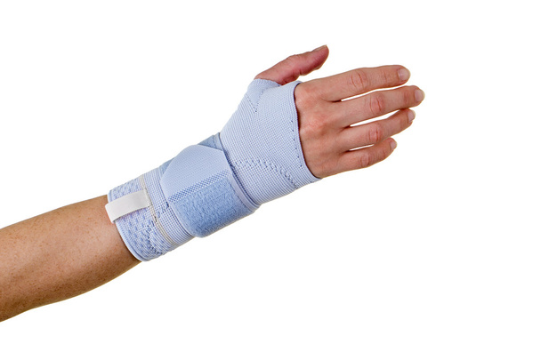 Person Wearing Supportive Hand and Wrist Brace - Foto, Bild