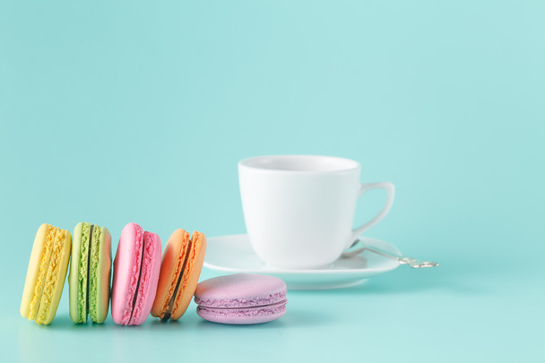 French macaroons with cup of coffee - Fotó, kép