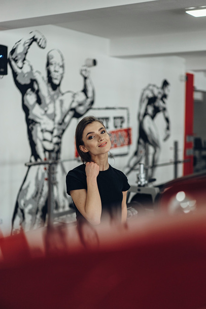 Sexy girl in the gym - Фото, изображение