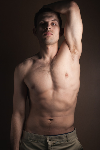 muscular guy without a shirt - Foto, Bild