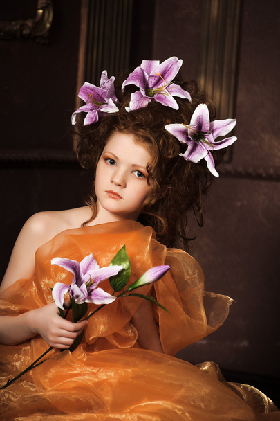 Girl with lilac lilies in her hair - Фото, зображення