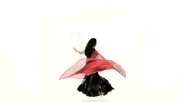 Beautiful exotic belly dancer with two wings, in unusual suit dance, on white, slow motion - Séquence, vidéo