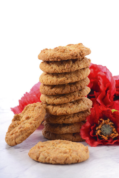 Traditional ANZAC Biscuits with Poppies - Photo, Image
