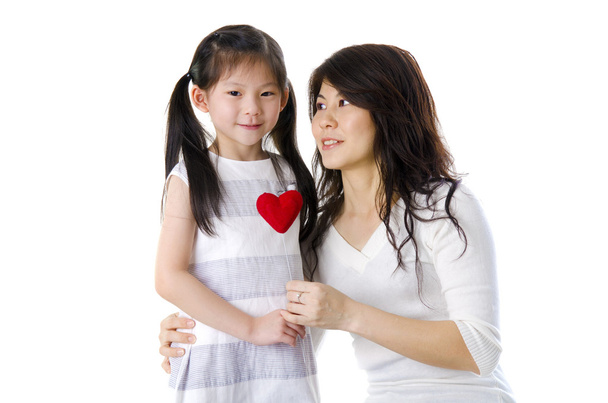 Photo of Asian mother and daughter on white background - Photo, image