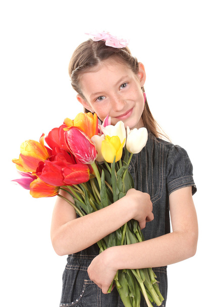 Portrait of beautiful little girl with tulips isolated on white - Foto, Imagen