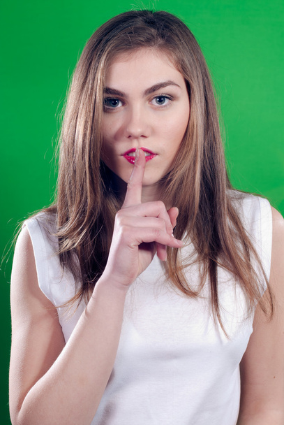 Young beautiful woman with silence sign - Фото, изображение