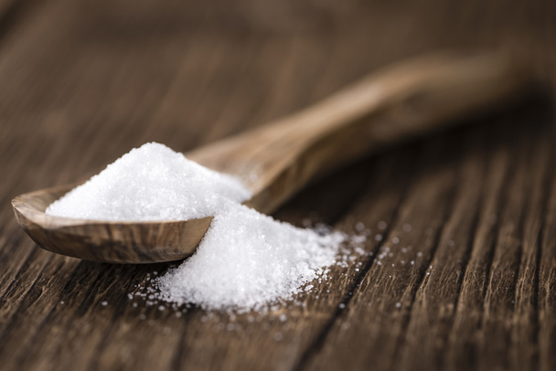 White Sugar on a spoon - Фото, изображение