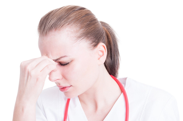 Zbliżenie doktora kobiece z migreny i bóle głowy  - Zdjęcie, obraz