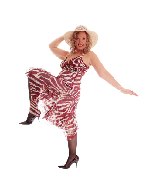 Frau tanzt in Kleid und Hut. - Foto, Bild