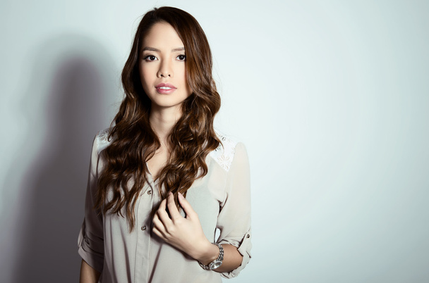beautiful young asian woman wearing a wrist watch - Zdjęcie, obraz