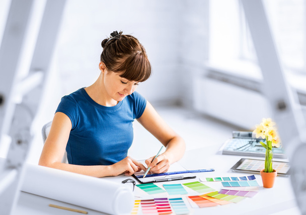 woman working with color samples for selection - Фото, изображение