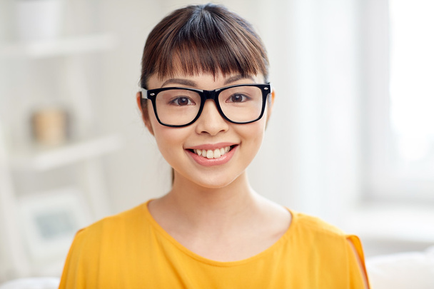 happy asian young woman in glasses at home - Valokuva, kuva