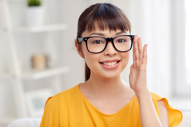 happy asian young woman in glasses at home - Foto, immagini